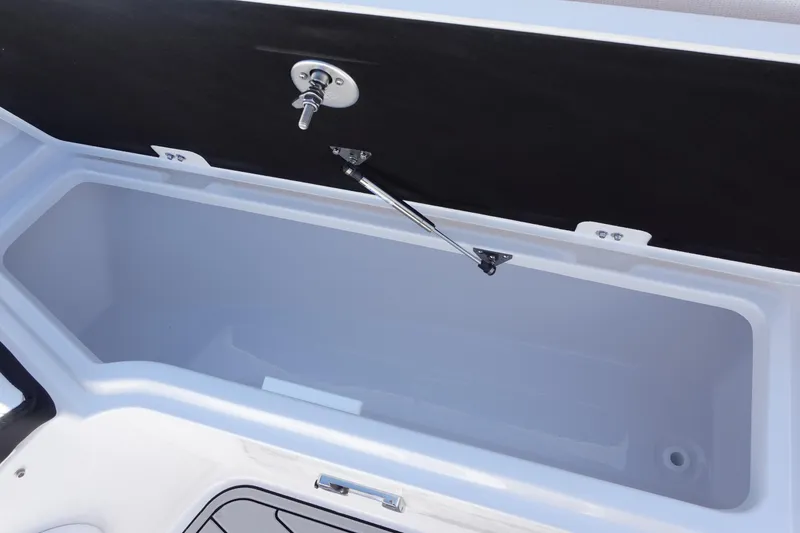  Yacht Photos Pics 2025 Sea Fox 328 Commander storage compartment with open lid and hydraulic support.