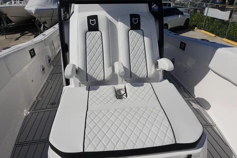  Yacht Photos Pics 2025 Sea Fox 328 Commander boat with luxurious white seating and diamond stitching.