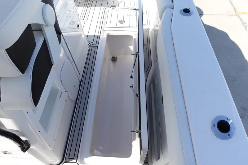  Yacht Photos Pics 2025 Sea Fox 328 Commander boat interior with open storage compartment.