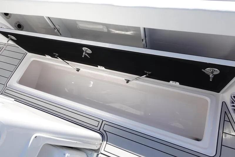  Yacht Photos Pics 2025 Sea Fox 328 Commander storage compartment with open lid, showcasing spacious interior.