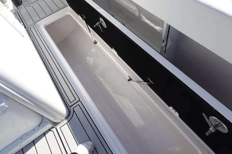  Yacht Photos Pics Storage compartment on 2025 Sea Fox 328 Commander boat, featuring sleek design and ample space.