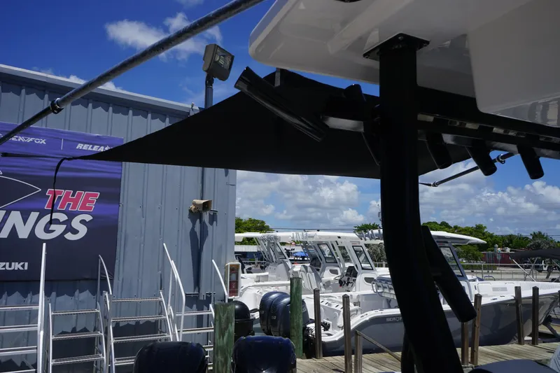  Yacht Photos Pics 2025 Sea Fox 328 Commander boat docked at marina with clear blue sky.