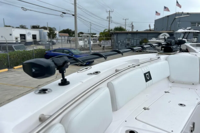 Yacht Photos Pics 2025 Sea Fox 328 Commander boat interior with white seating and mounted equipment.