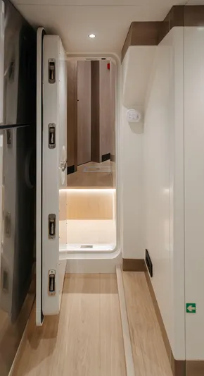 Bering 65 Explorer Yacht Yacht Photos Pics Interior hallway of 2026 Bering 65 yacht, featuring modern design and sleek finishes.