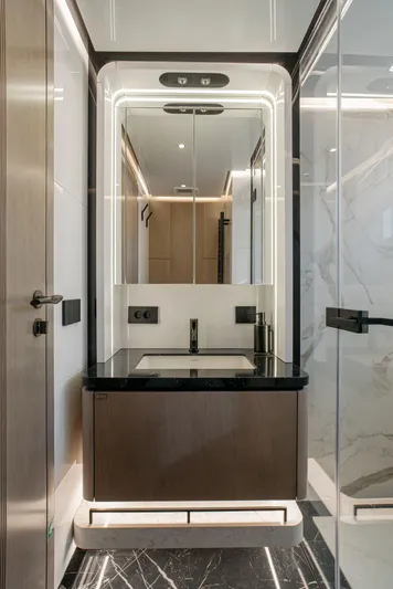 Bering 65 Explorer Yacht Yacht Photos Pics Modern bathroom interior on 2026 Bering 65 yacht, featuring sleek design and elegant fixtures.