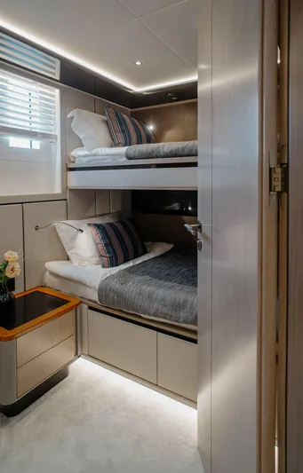 Bering 65 Explorer Yacht Yacht Photos Pics 2026 Bering 65 yacht cabin with modern bunk beds and elegant decor.
