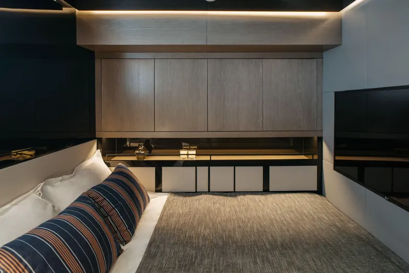 Bering 65 Explorer Yacht Yacht Photos Pics Luxurious interior of 2026 Bering 65 yacht with modern design and cozy bedding.