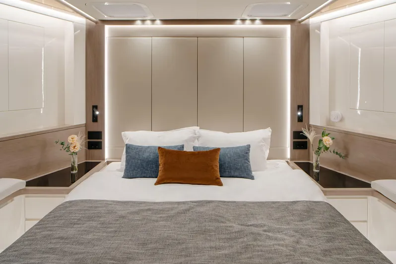 Bering 65 Explorer Yacht Yacht Photos Pics Luxurious bedroom interior of 2026 Bering 65 yacht with modern design and elegant decor.