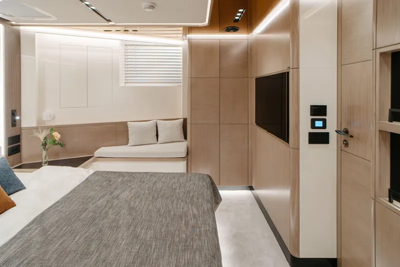 Bering 65 Explorer Yacht Yacht Photos Pics Luxurious interior of 2026 Bering 65 yacht with modern design and cozy seating area.