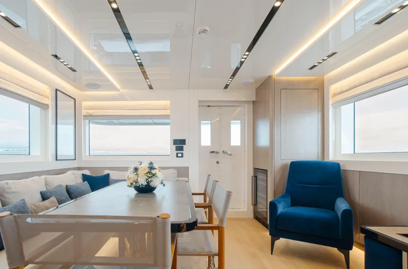 Bering 65 Explorer Yacht Yacht Photos Pics Luxurious interior of 2026 Bering 65 yacht with modern seating and elegant decor.
