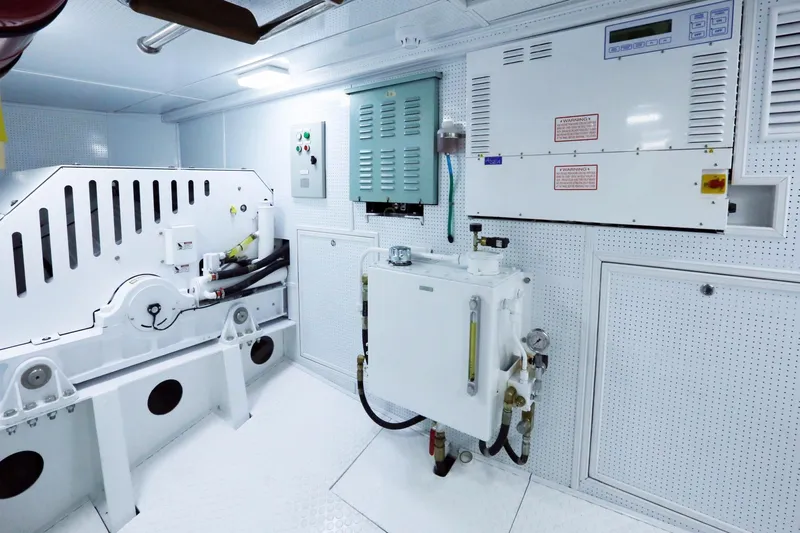 Bering 65 Explorer Yacht Yacht Photos Pics Engine room of 2026 Bering 65 yacht, featuring advanced control panels and machinery.