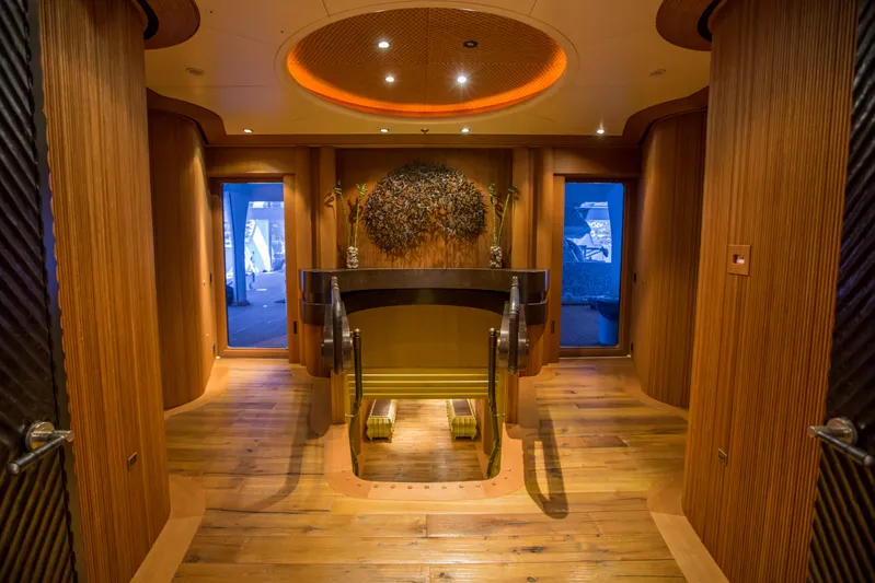 Pelorus Yacht Photos Pics Luxurious Lurssen Custom yacht interior, 2003 model, featuring elegant wood paneling and ambient lighting.