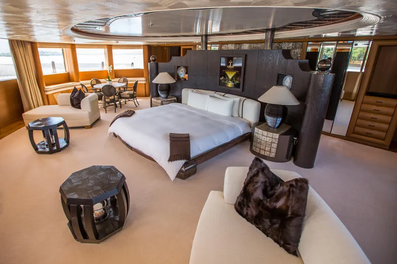 Pelorus Yacht Photos Pics Luxurious Lurssen Custom yacht bedroom interior, featuring elegant furnishings and panoramic windows, 2003 model.