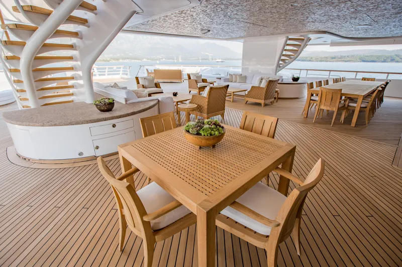 Pelorus Yacht Photos Pics Luxurious Lurssen Custom yacht deck with elegant wooden furniture, 2003 model.