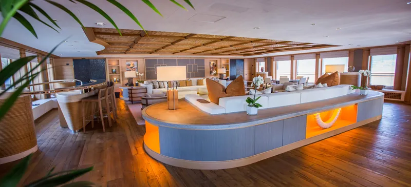 Pelorus Yacht Photos Pics Luxurious interior of 2003 Lurssen Custom yacht with elegant furnishings and ambient lighting.