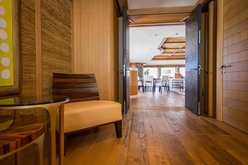 Pelorus Yacht Photos Pics Luxurious interior of 2003 Lurssen Custom yacht with elegant wooden flooring and modern decor.