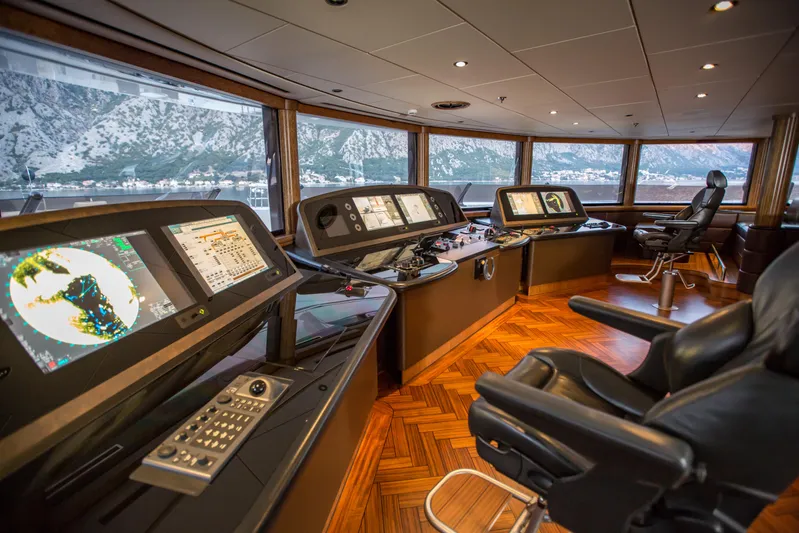 Pelorus Yacht Photos Pics Luxurious yacht bridge with advanced navigation systems, Lurssen Custom 2003 model, featuring panoramic views.