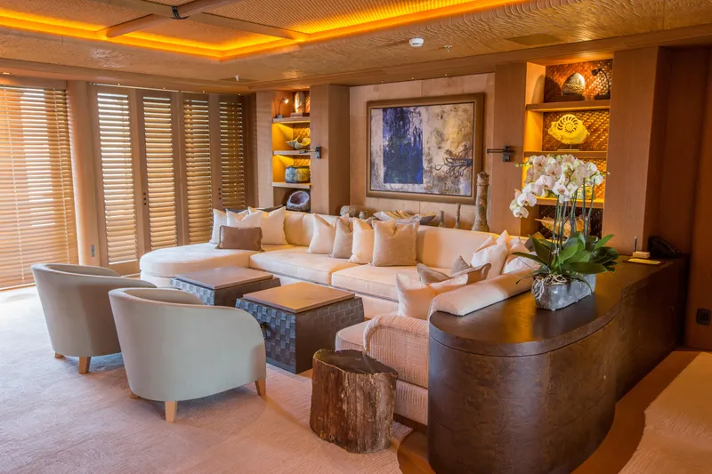 Pelorus Yacht Photos Pics Luxurious yacht interior with elegant seating, warm lighting, and modern decor. Lurssen Custom 2003.