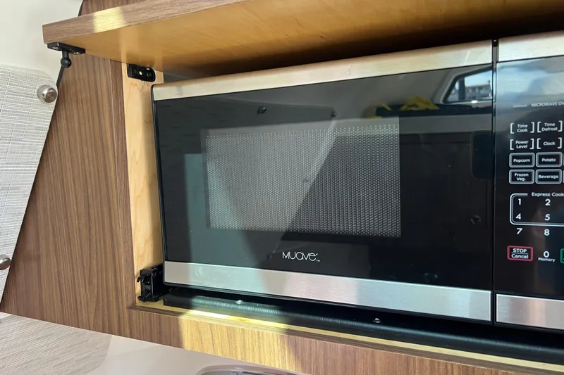 M22 Yacht Photos Pics Microwave oven inside 2019 Boston Whaler 380 Outrage boat kitchen area.