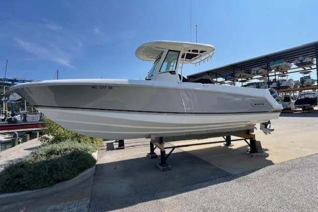  Yacht Photos Pics 2020 Boston Whaler 280 Outrage boat on display at a marina.