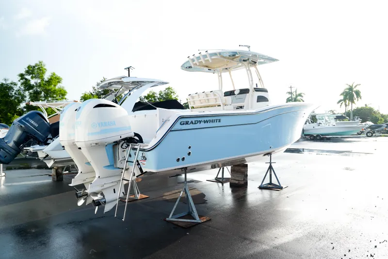  Yacht Photos Pics 2021 Grady-White Canyon 271 boat on stands, featuring twin outboard engines.