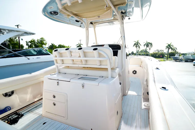  Yacht Photos Pics 2021 Grady-White Canyon 271 boat interior with seating and storage.