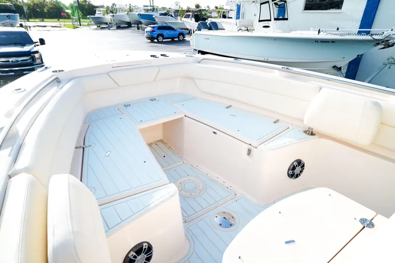 Yacht Photos Pics 2021 Grady-White Canyon 271 boat interior with spacious seating and storage.