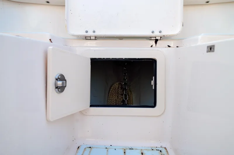  Yacht Photos Pics Open storage compartment on 2021 Grady-White Canyon 271 boat.