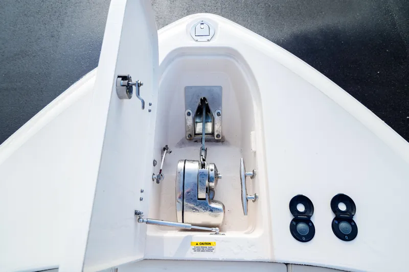  Yacht Photos Pics 2021 Grady-White Canyon 271 anchor locker with open hatch and winch.