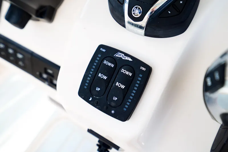  Yacht Photos Pics Close-up of 2021 Grady-White Canyon 271 boat control panel with trim tab switches.
