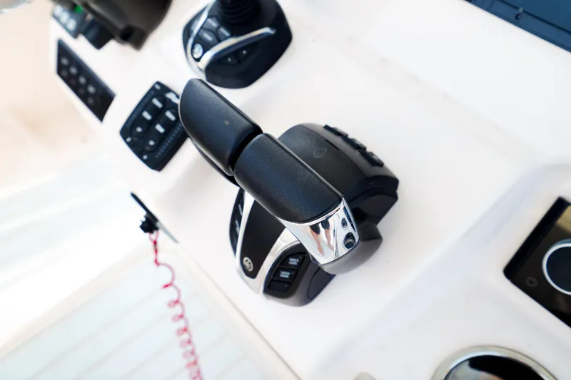  Yacht Photos Pics Close-up of 2021 Grady-White Canyon 271 boat controls and throttle.