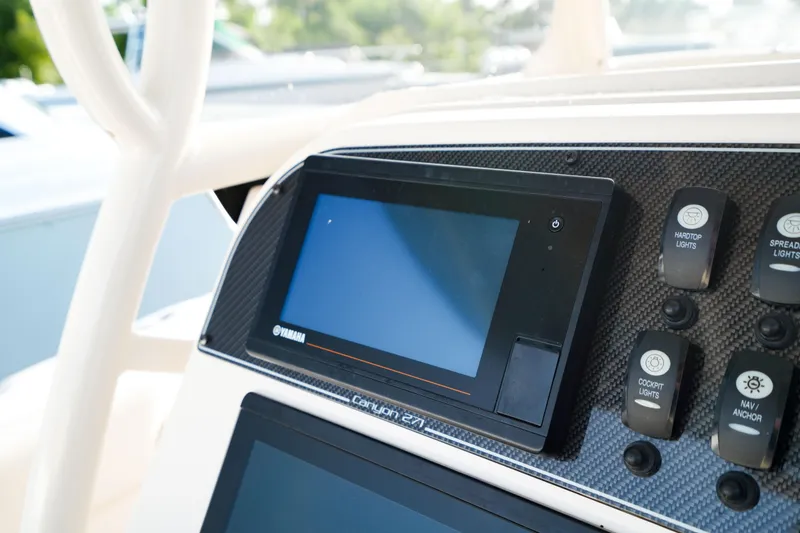  Yacht Photos Pics Grady-White Canyon 271 dashboard with Yamaha display, 2021 model.