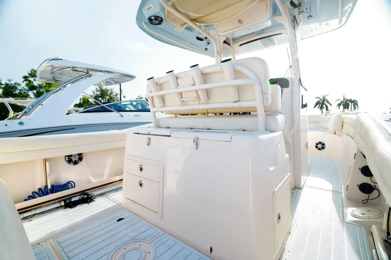  Yacht Photos Pics 2021 Grady-White Canyon 271 boat interior with seating and storage.