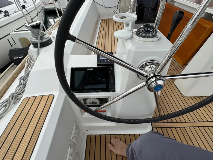 Gayle Force Yacht Photos Pics Steering wheel and navigation equipment on a 2014 Beneteau Oceanis 38 sailboat.