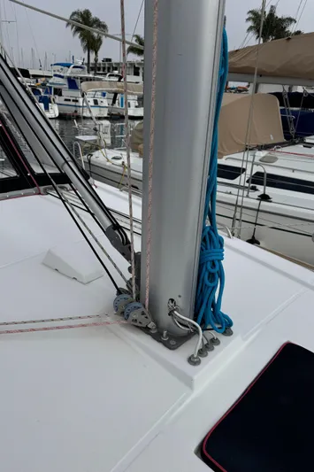 Gayle Force Yacht Photos Pics Beneteau Oceanis 38 sailboat deck, 2014 model, with rigging and marina background.