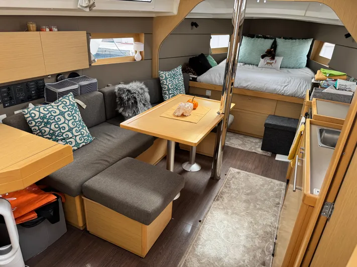 Gayle Force Yacht Photos Pics Interior of 2014 Beneteau Oceanis 38 sailboat with cozy seating and modern decor.