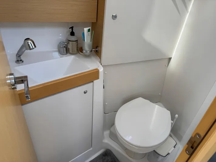 Gayle Force Yacht Photos Pics Compact bathroom in 2014 Beneteau Oceanis 38 yacht with sink and toilet.