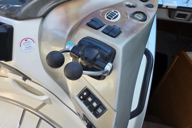 Nina & Alexander Yacht Photos Pics Control panel of 2007 Cranchi Mediterranee 47 HT yacht with throttle levers.