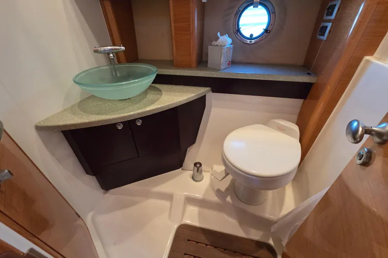 Nina & Alexander Yacht Photos Pics Luxurious bathroom in 2007 Cranchi Mediterranee 47 HT yacht with modern fixtures.