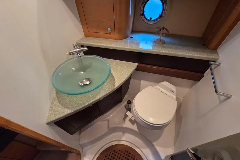 Nina & Alexander Yacht Photos Pics Luxurious bathroom in 2007 Cranchi Mediterranee 47 HT yacht with modern fixtures.