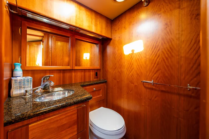 Consequence Free Yacht Photos Pics Luxurious wooden bathroom interior of 2009 Coastal Craft 400 IPS yacht.