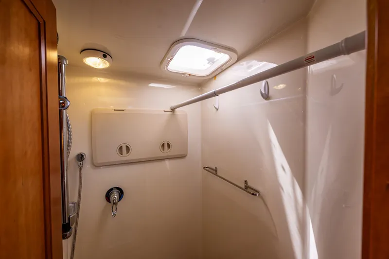 Consequence Free Yacht Photos Pics Shower area in 2009 Coastal Craft 400 IPS yacht, featuring modern fixtures and natural lighting.
