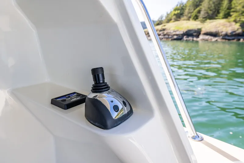 Consequence Free Yacht Photos Pics Joystick control on 2009 Coastal Craft 400 IPS boat, with scenic water view.
