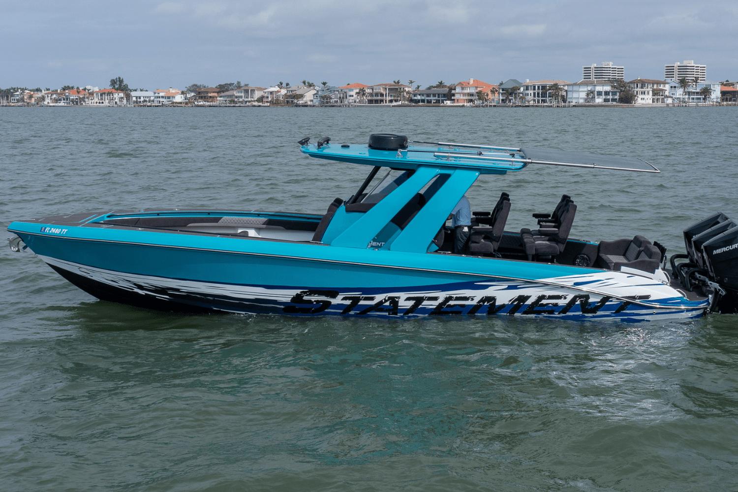 2024 Statement 38 Open boat on water, featuring sleek design and vibrant blue color.