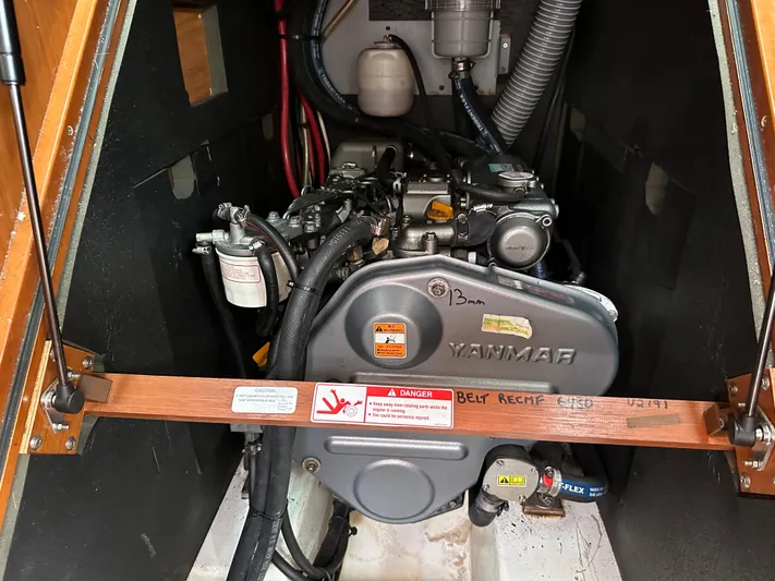 Traveller Two Yacht Photos Pics Engine compartment of a 2012 Beneteau Oceanis 45 sailboat with Yanmar engine.