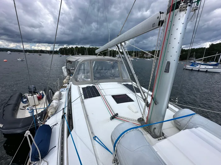 Traveller Two Yacht Photos Pics Beneteau Oceanis 45 sailboat, 2012 model, docked on a cloudy day with visible rigging.