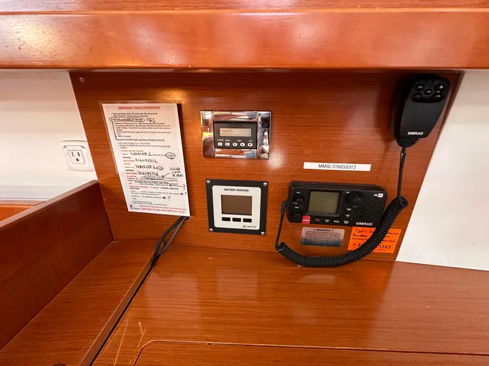 Traveller Two Yacht Photos Pics Control panel of a 2012 Beneteau Oceanis 45 sailboat with communication equipment.