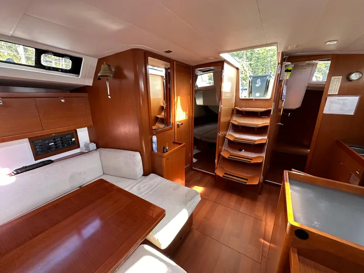 Traveller Two Yacht Photos Pics Interior of 2012 Beneteau Oceanis 45 yacht, featuring wood finishes and comfortable seating.