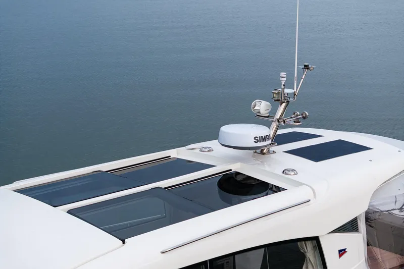 Crazy Love Yacht Photos Pics Rooftop view of 2023 Nimbus 405 Coup&eacute; yacht with navigation equipment.