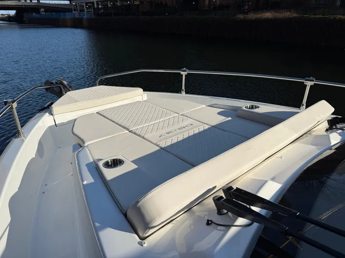  Yacht Photos Pics 2025 Jeanneau DB/37 OB boat with spacious sunbathing deck on calm water.